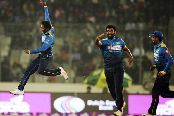 Sri Lanka's players looked ecstatic while the vanquished Bangladesh cricketers stared at their counterparts, expressionless, wondering what might have been. Sri Lanka's players looked ecstatic while the vanquished Bangladesh cricketers stared at their counterparts, expressionless, wondering what might have been.