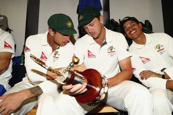 Players take a hard look at the Trans-Tasman trophy. Players take a hard look at the Trans-Tasman trophy.