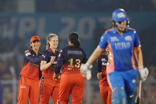 RCB celebrate the wicket of Nat Sciver-Brunt RCB celebrate the wicket of Nat Sciver-Brunt