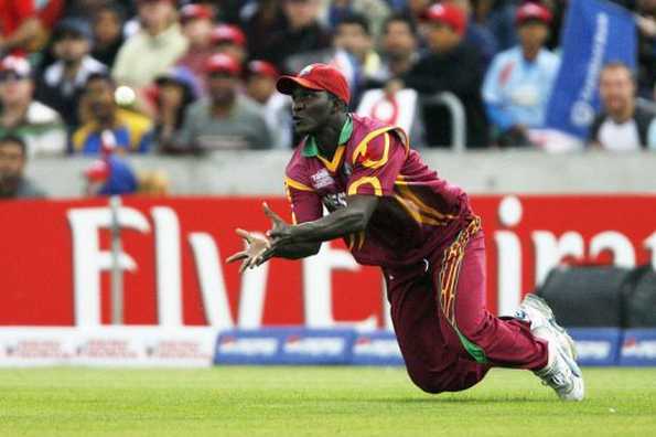This picture taken on June 19, 2009 shows Darren Sammy of the West Indies trying to take a catch during a Twenty20 World Cup match at the Oval in London. Egos to the left of him, record-setters to the right: Sammy, unheralded captain of the West Indies, faces mission impossible at the World Cup. This picture taken on June 19, 2009 shows Darren Sammy of the West Indies trying to take a catch during a Twenty20 World Cup match at the Oval in London. Egos to the left of him, record-setters to the right: Sammy, unheralded captain of the West Indies, faces mission impossible at the World Cup.