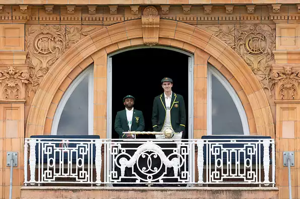 Bavuma and Cummins pose with the mace. Bavuma and Cummins pose with the mace.