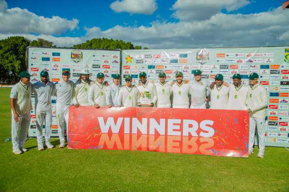 SA players pose with the trophy 