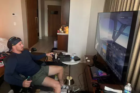 A certified pilot, Phillips was found mid-flight on his hotel room's full-fledged flight simulator when Cricbuzz dropped by for a chat